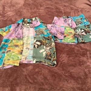 Worn once Amiri Men’s medium shirt and large shorts swim wear.